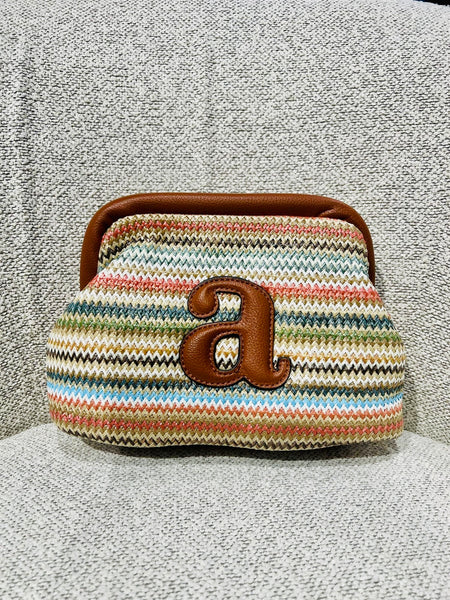 RAFFIA CLUTCH STRIPE CORAL COMBO