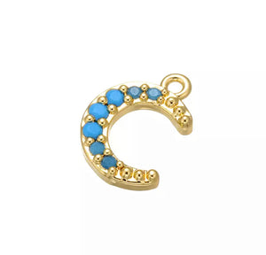 BLUE MOON charms gull med turkise stener